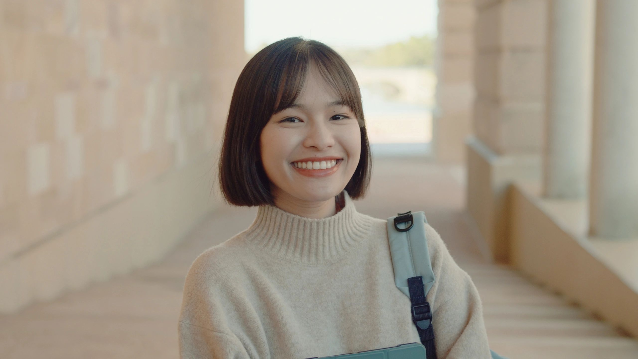 happy student testimonial portrait